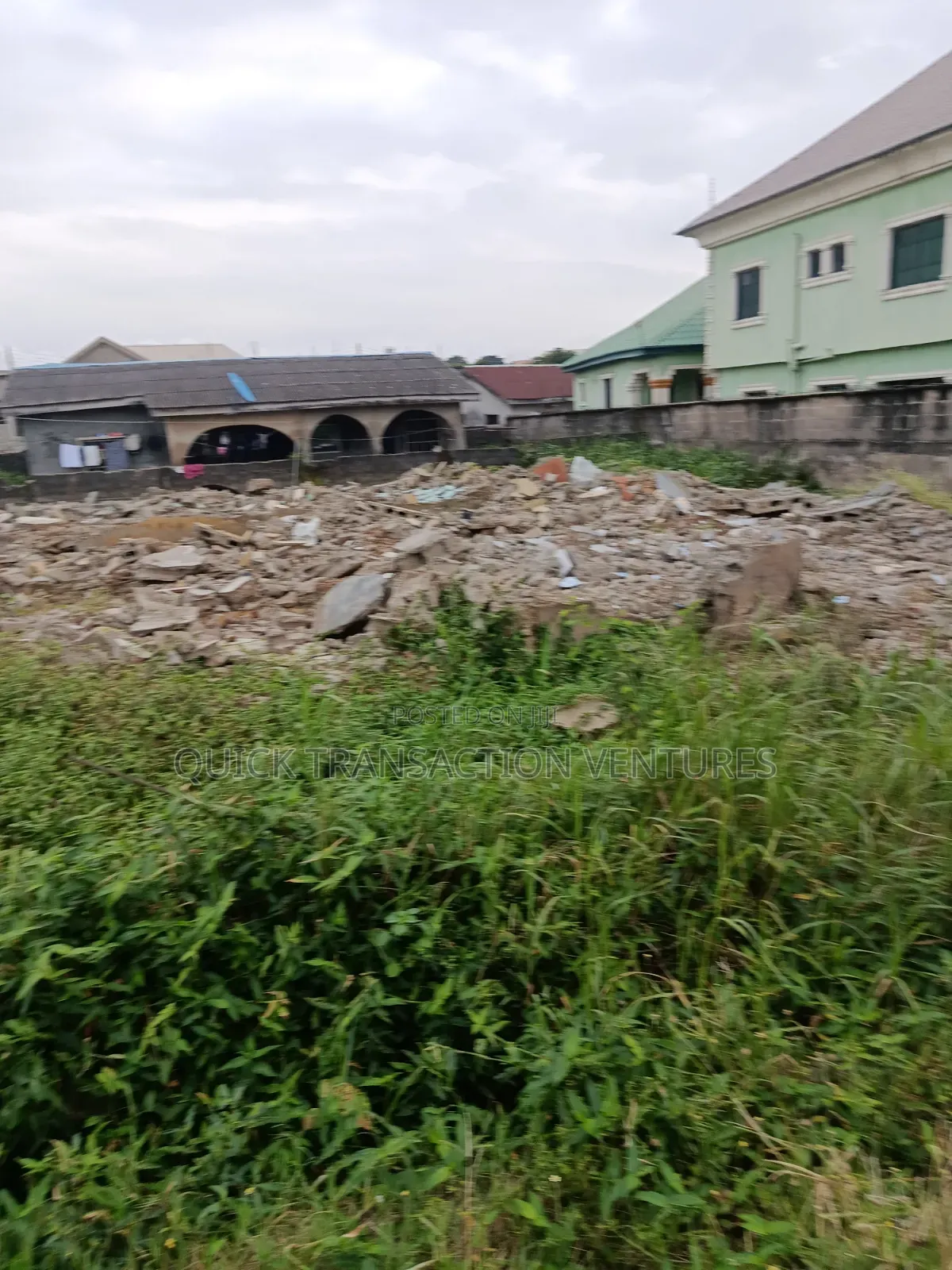 Dry half.plot of Land Fenced Round on a Corner Piece in Bucknor