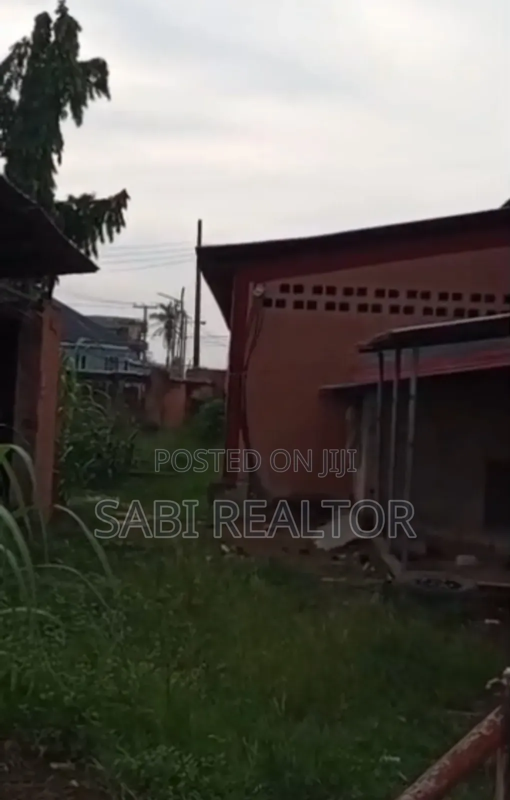 9 Plots With a 5 Bays Warehouse of a Storey Building at Oluwaga Ipaja in Iyana Ipaja