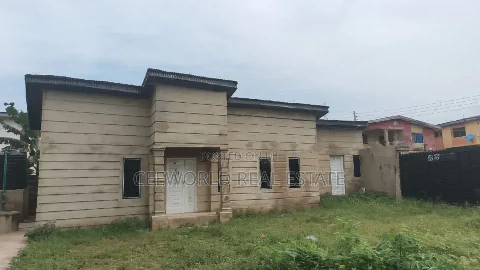 A Standard Plot of Land With Uncompleted Room and Parlour Self Con in Oluyole Estate