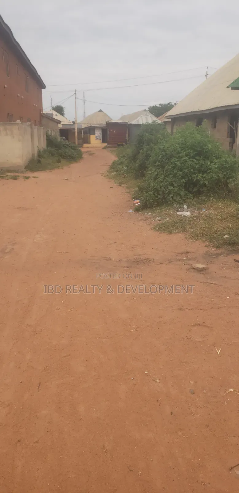 A Standard 10-Room Self-Contained Uncompleted Hostel Seating on 2plot in Moro
