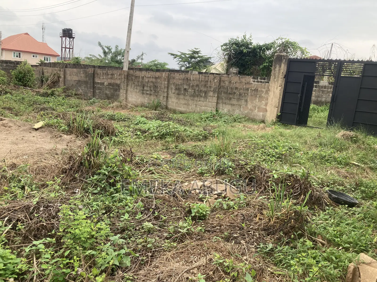 For Sale: A Fenced and Gated Plot of Land in Akala Express