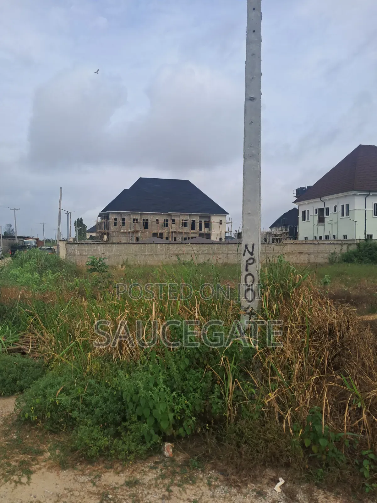 Dry Land at SatelliteTown Nasxo Estate Global C of O No Omonile in Satellite Town