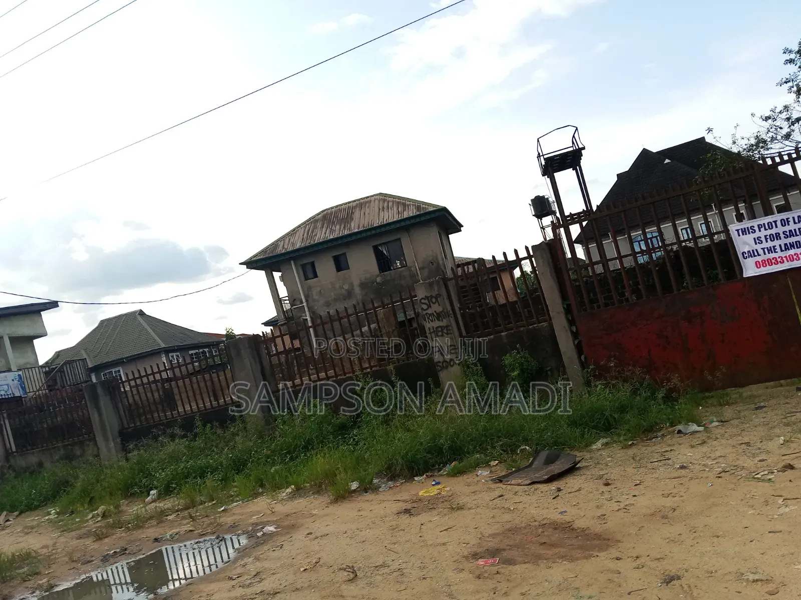 A Plot of Land for Sale Along the Road in East West Road