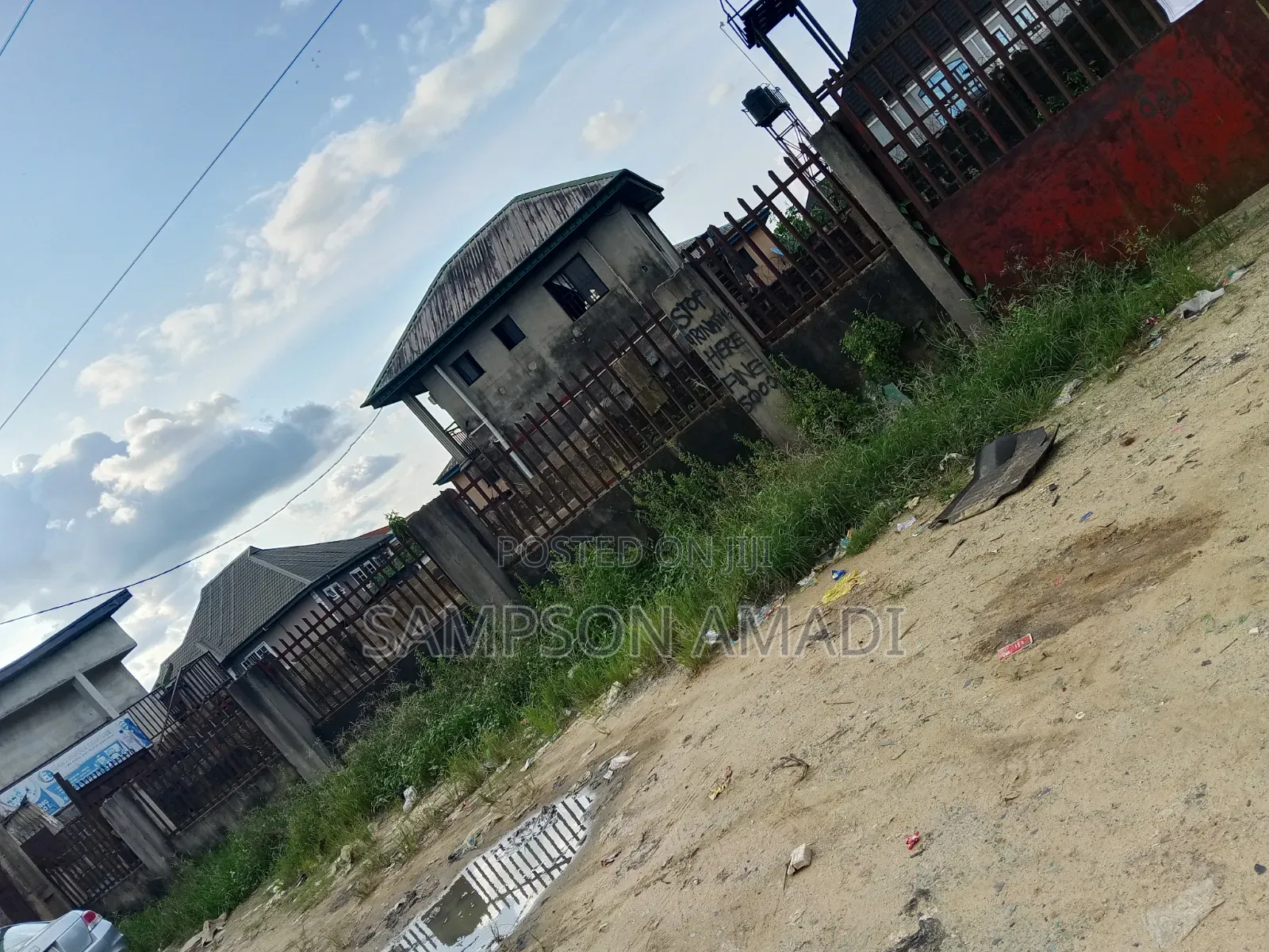 A Plot of Land for Sale Along the Road in East West Road