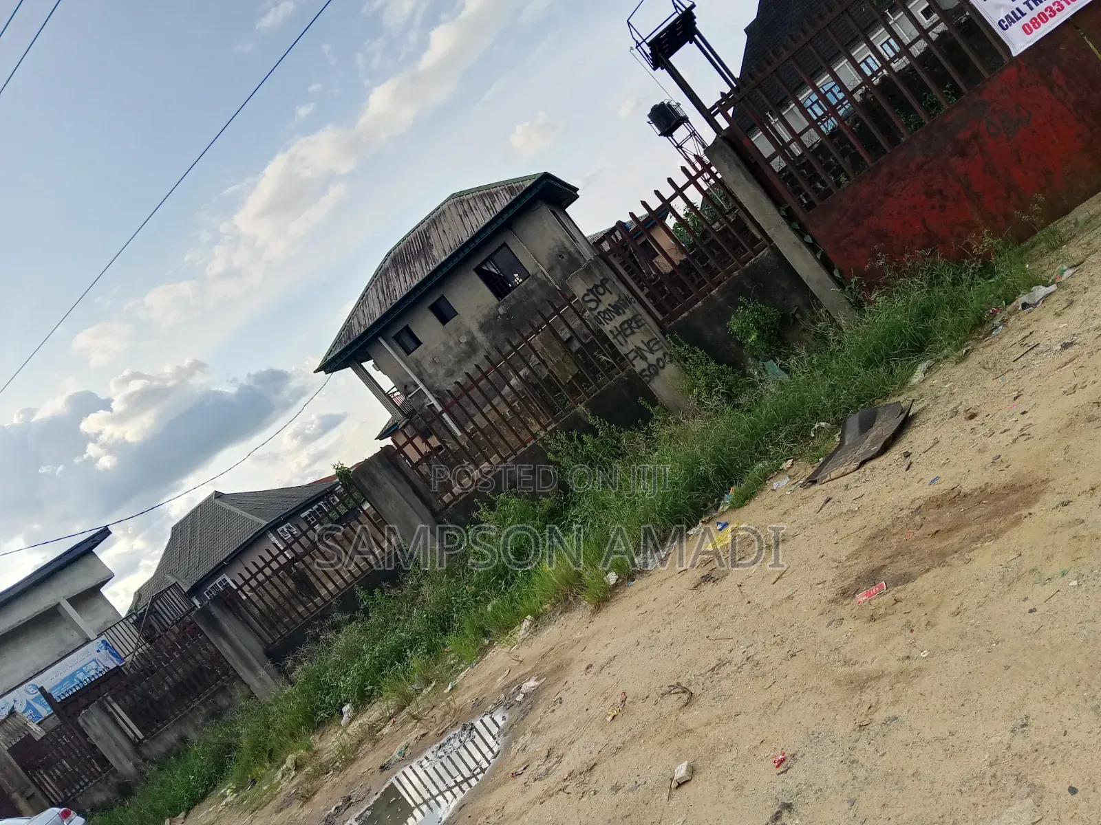 A Plot of Land for Sale Along the Road in East West Road
