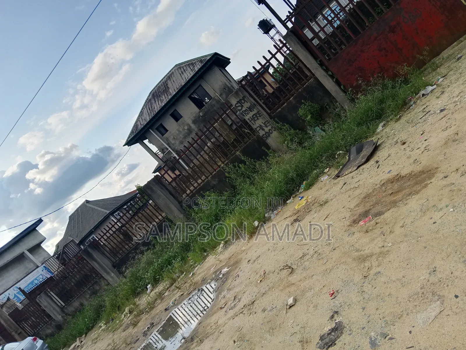 A Plot of Land for Sale Along the Road in East West Road