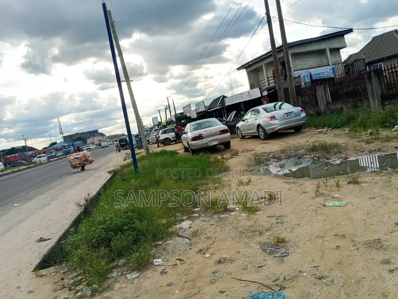 A Plot of Land for Sale Along the Road in East West Road