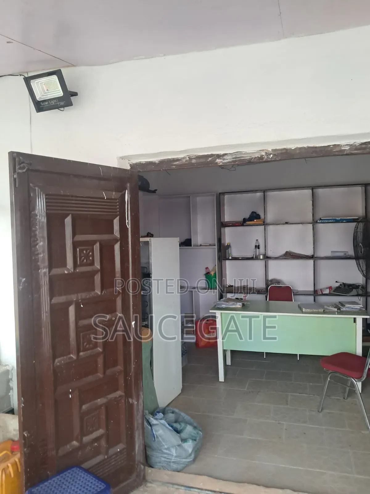 Shop on a Busy Road 800k Annual SatelliteTown in Satellite Town