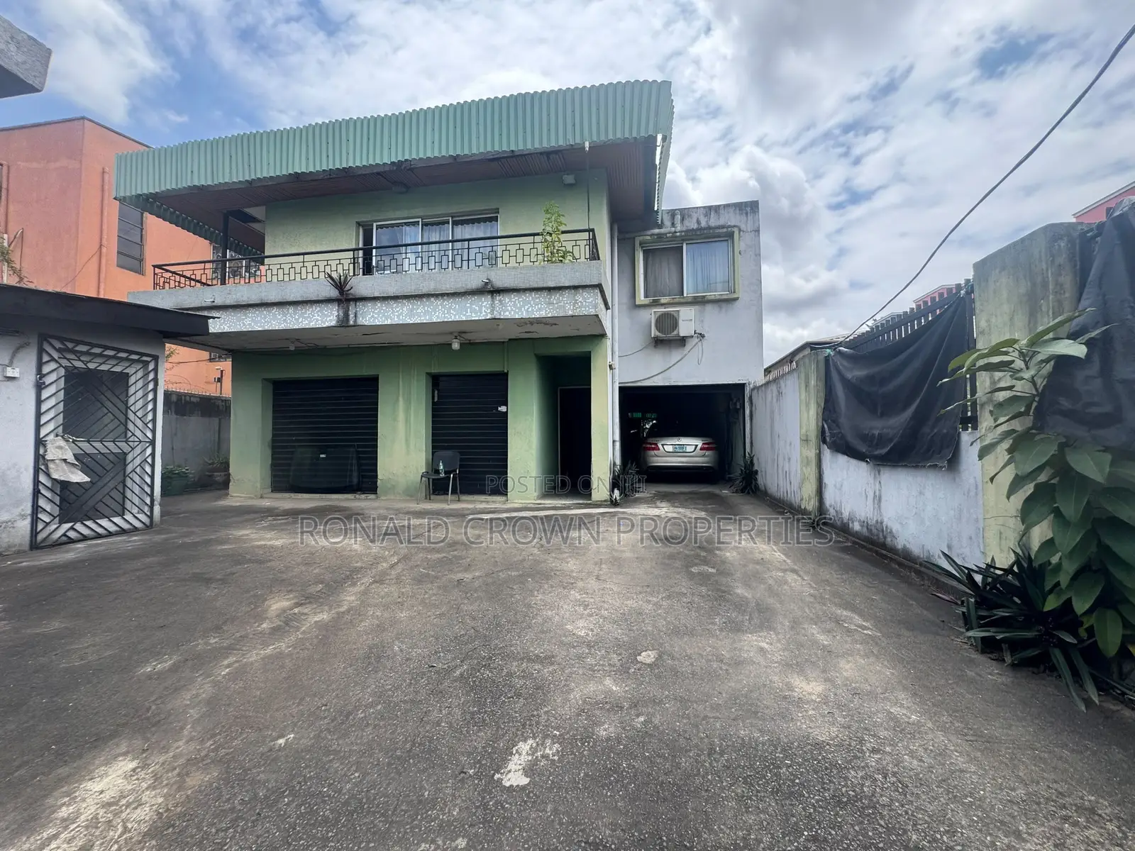 Land Measuring 557sqm With Duplex Structure on It at Ikeja in Opebi