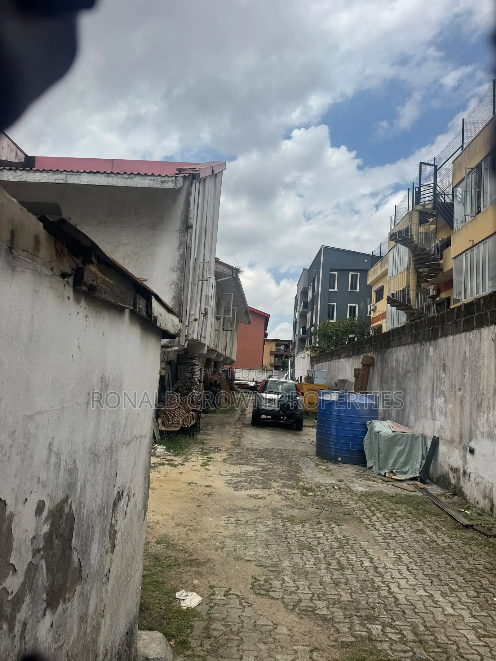 A Corner Piece Land Measuring 878sqm in a Secure Neighborhood at Ikeja in Opebi