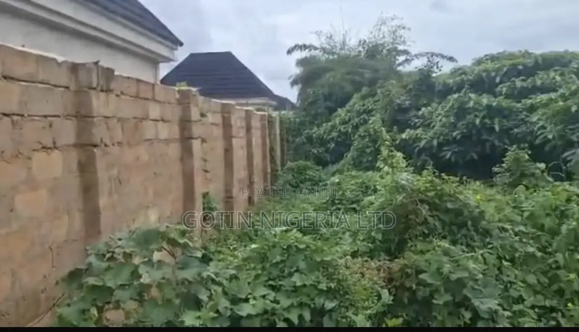 Fenced 100×100ft C of O Land at BIU Estate, Amagba GRA in Benin City