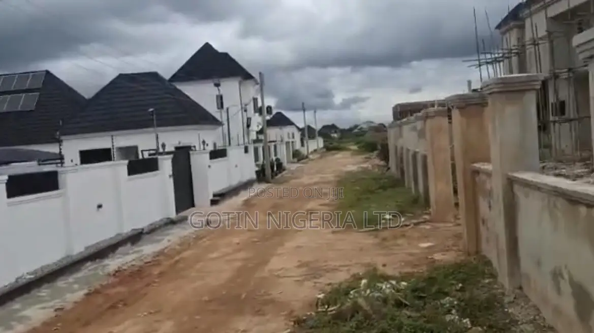 Fenced 100×100ft C of O Land at BIU Estate, Amagba GRA in Benin City