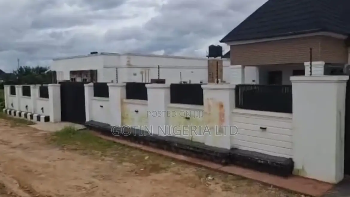 Fenced 100×100ft C of O Land at BIU Estate, Amagba GRA in Benin City