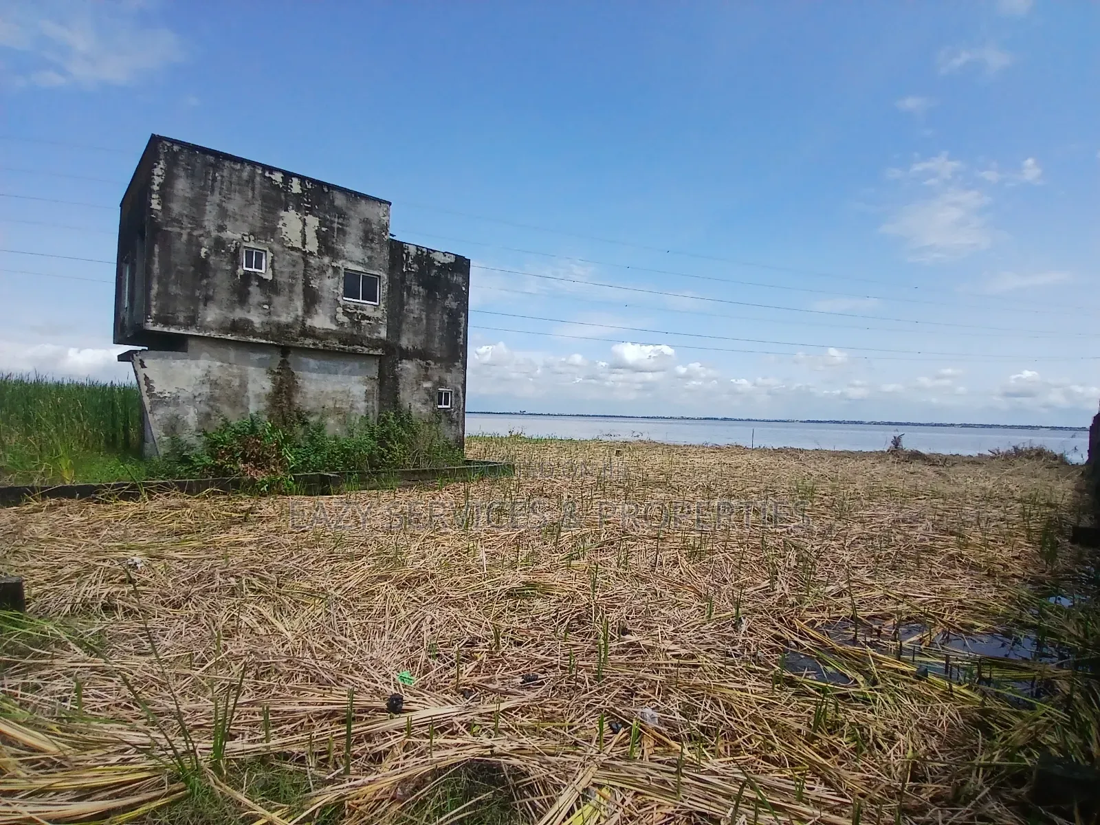 Waterfront Land Measuring 2,398sqm (4plots) in Badore Road, Ajah in Badore
