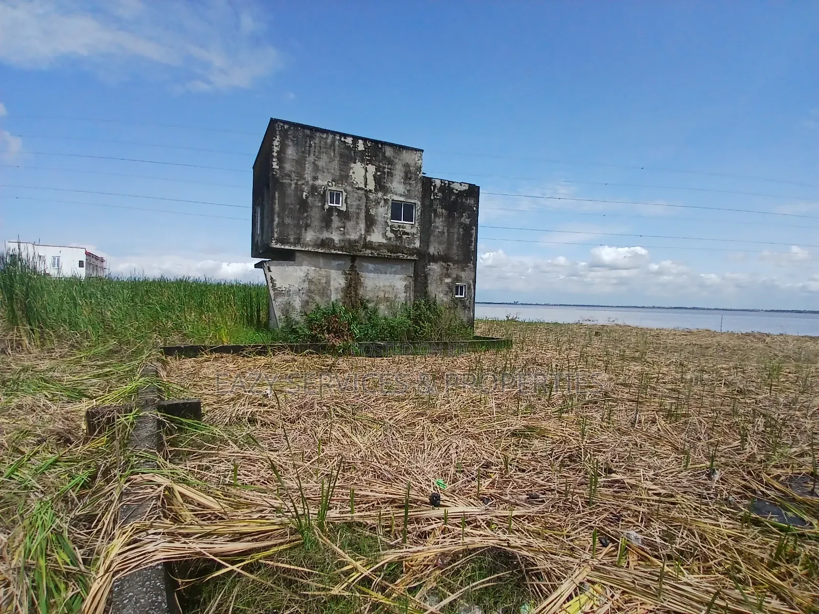 Waterfront Land Measuring 2,398sqm (4plots) in Badore Road, Ajah in Badore