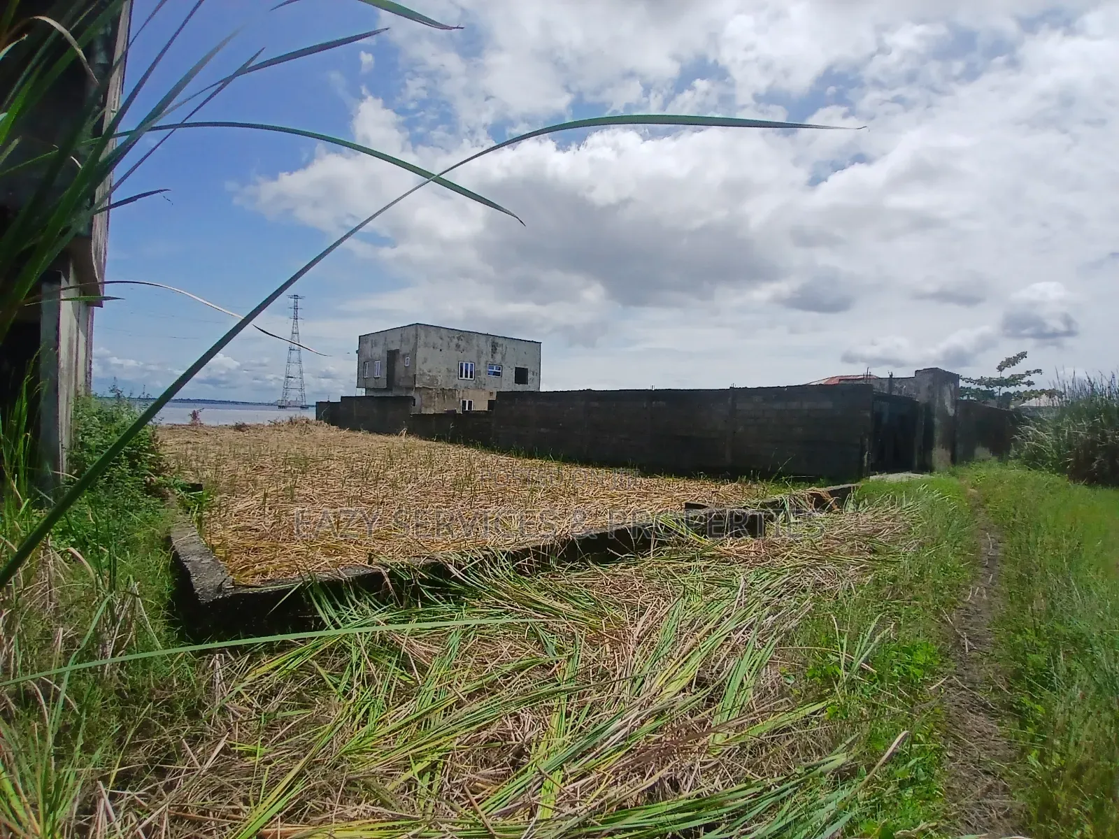Waterfront Land Measuring 2,398sqm (4plots) in Badore Road, Ajah in Badore