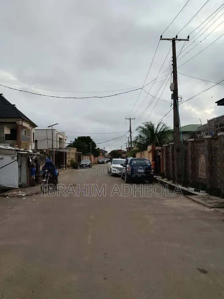 Half Plot of Land With a Demolishable Structure, on a Tared Street in Egbeda