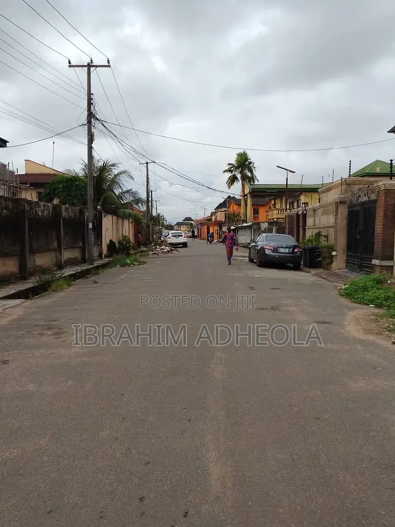 Half Plot of Land With a Demolishable Structure, on a Tared Street in Egbeda