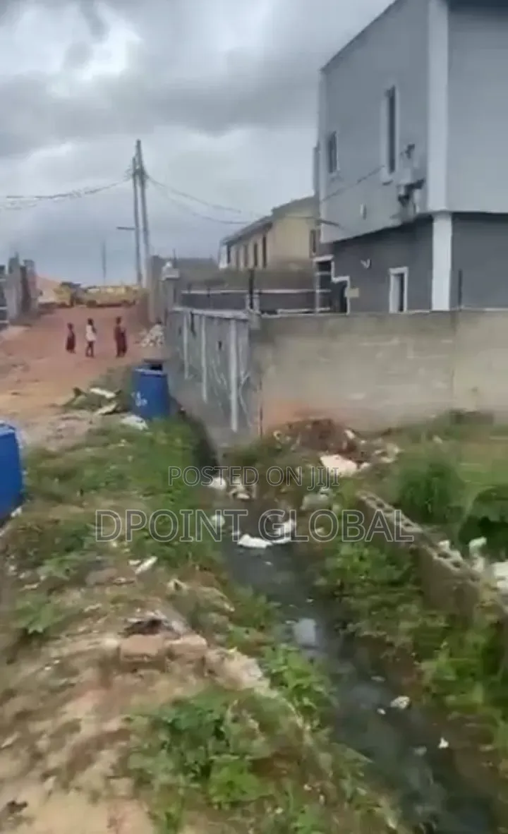A Quarter Plot With C of O in Aboru Area in Iyana Ipaja