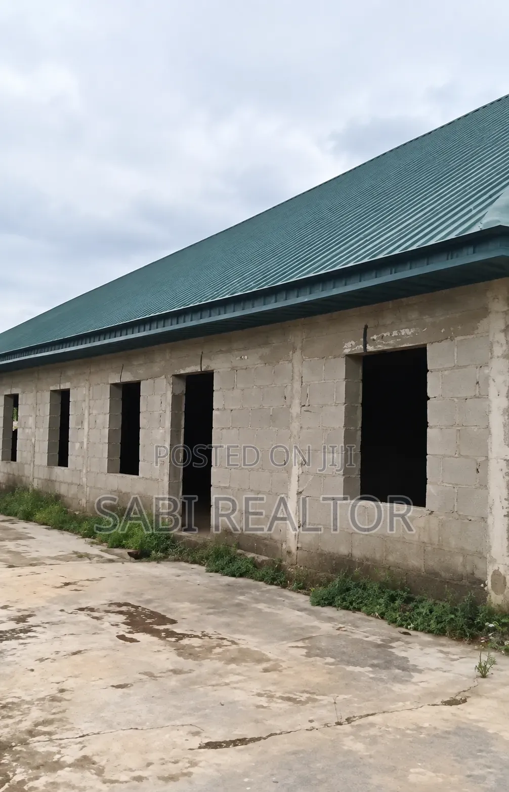 Uncompleted Event Centre With Massive Car Park on 2 Plots of Land in Ayobo