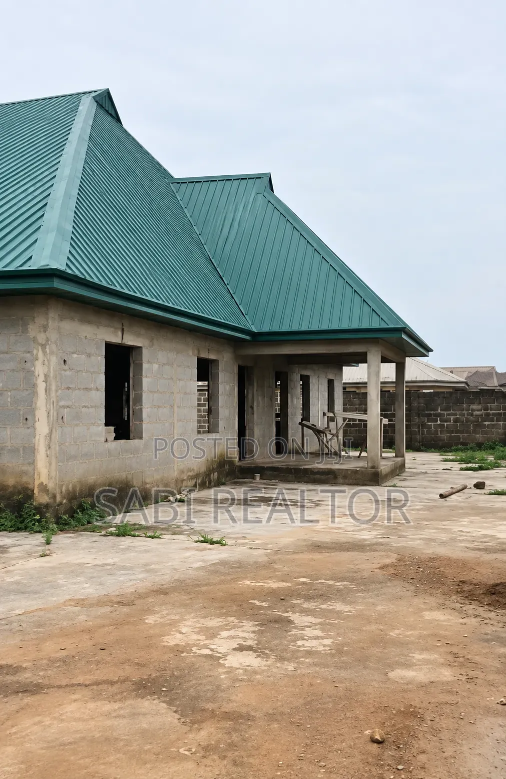 Uncompleted Event Centre With Massive Car Park on 2 Plots of Land in Ayobo
