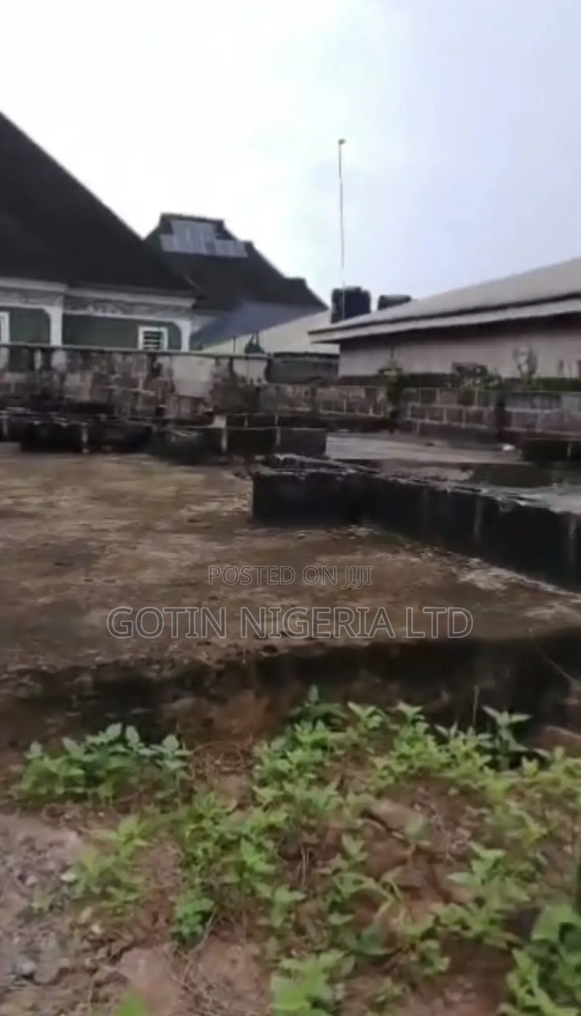 50×100ft Land With Building at DPC Level for Sale in Benin City