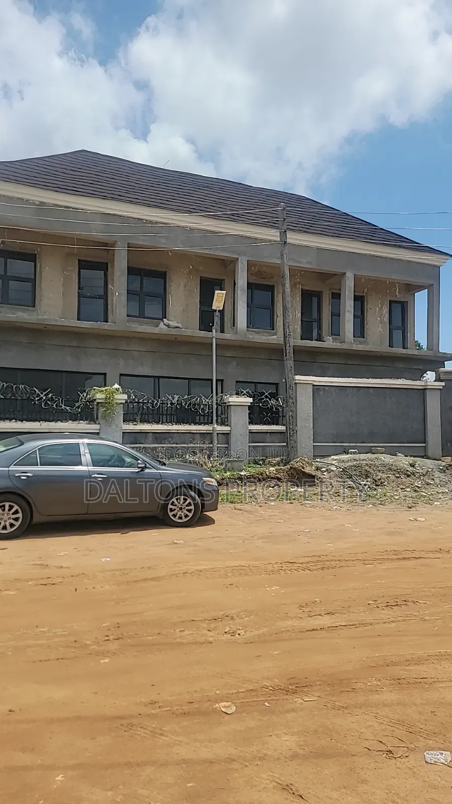 A Commercial Property of 8 Shops Plaza.4shops Up and Open Ground Floor in Sabon Lugbe