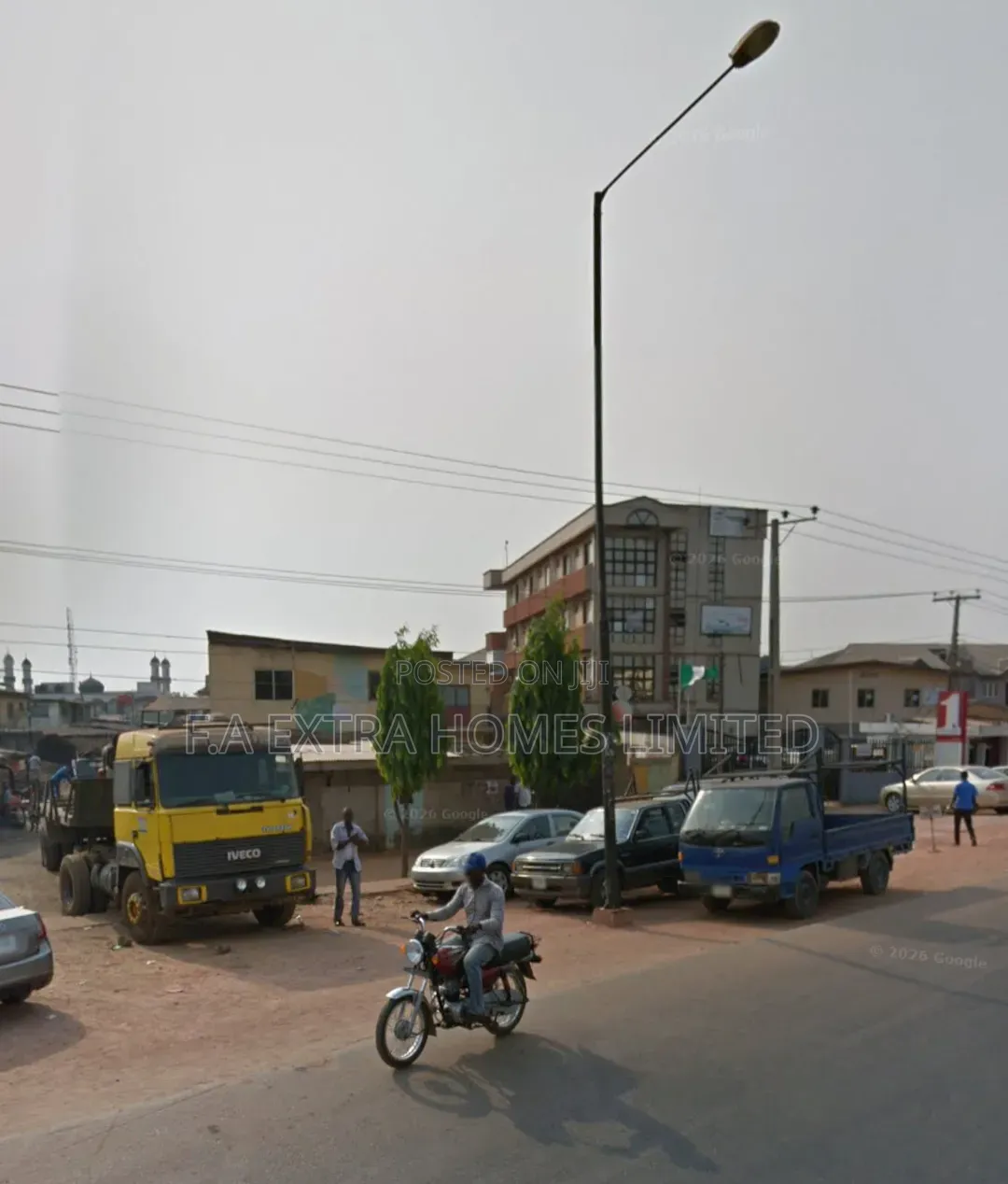 A Commercial Land, With (2 Units) of One Storey Building Structure in Akesan