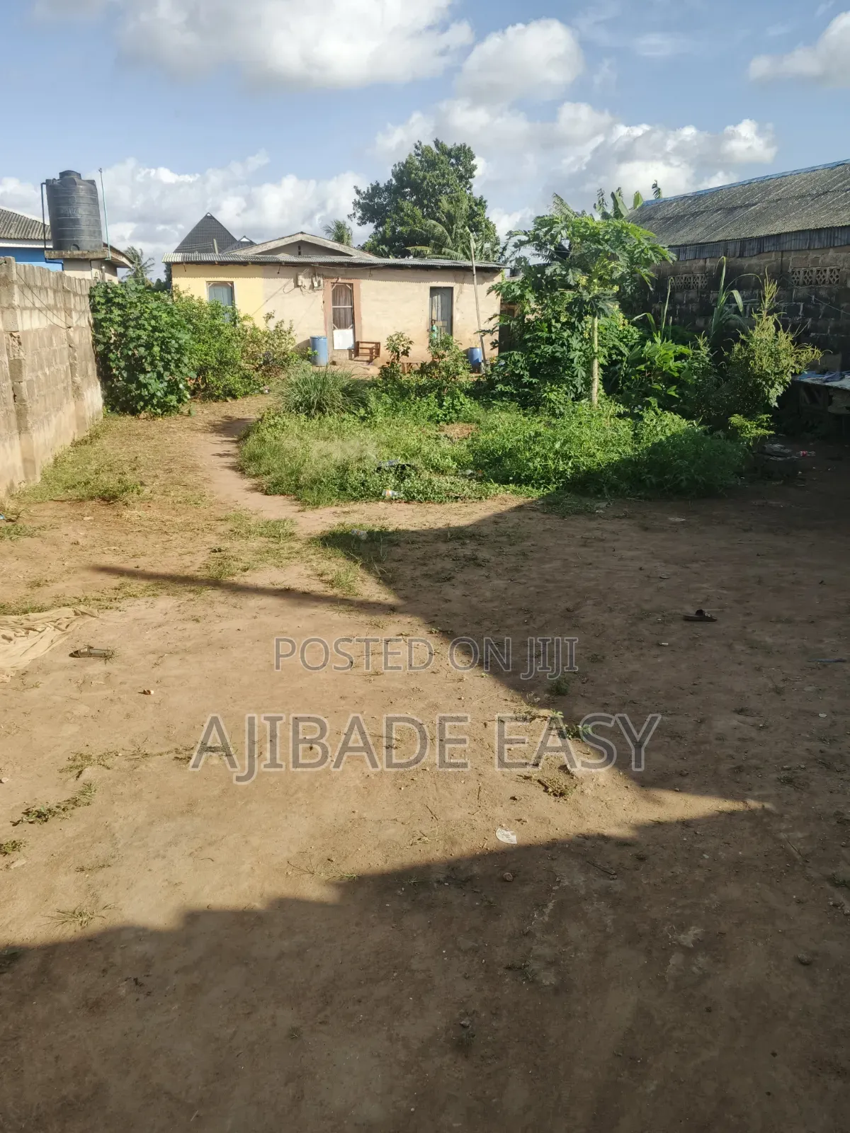 Almost Full Plot of Land With a Demolishable Structure in Ayobo