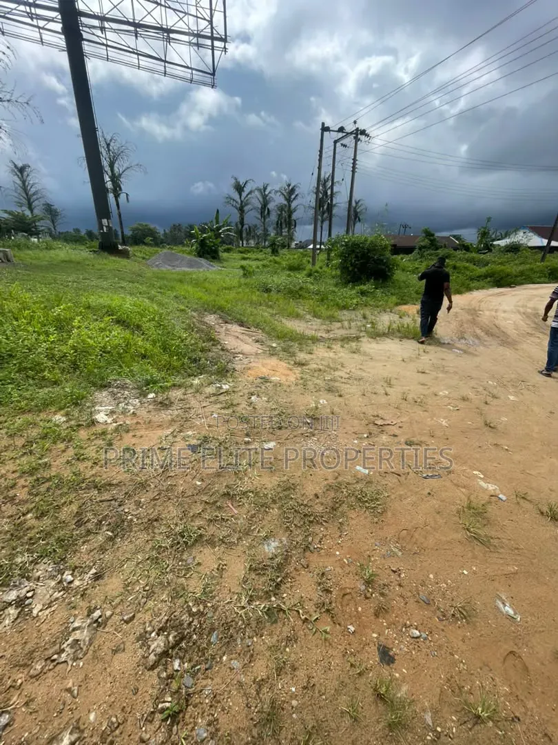 Buy and Build 546SQM Land -High Tension Pole Negotiable for Removal. in Uyo