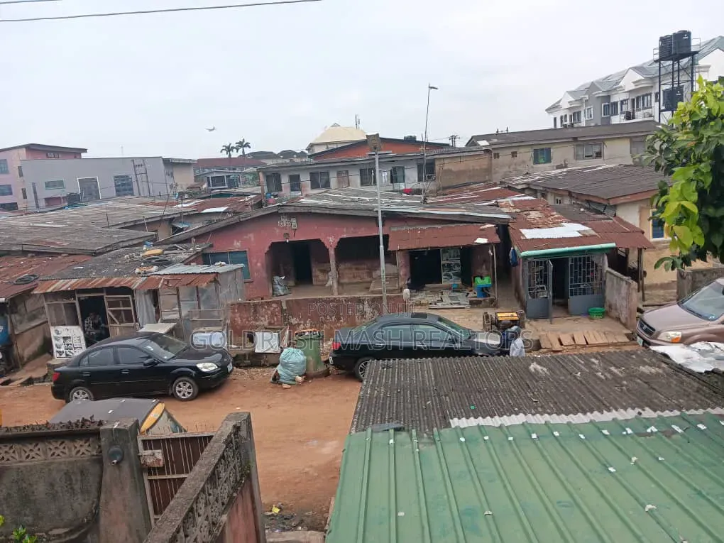 A Full Plot of Land With a Demolishable Building in Ogba Bus-Stop