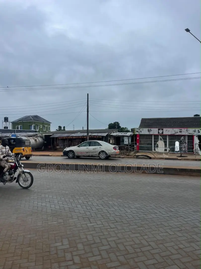 Land With 3 Shops and 2 Mini Flats for Sale in Ijede / Ikorodu