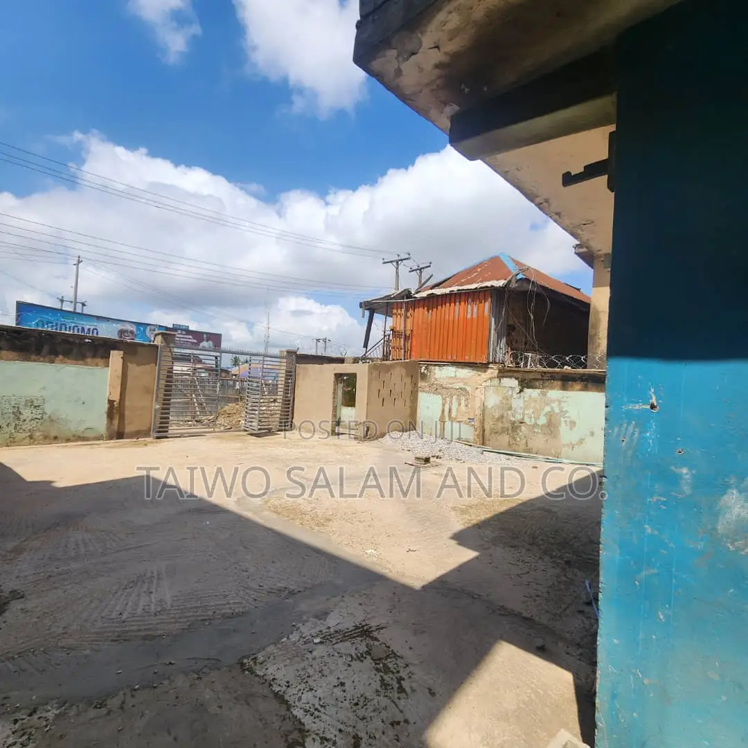 A Two Storey Office Complex With a Shop in Apata
