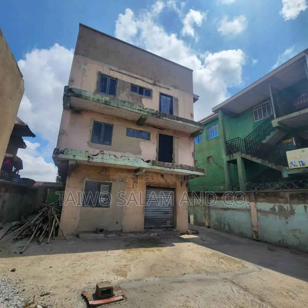 A Two Storey Office Complex With a Shop in Apata