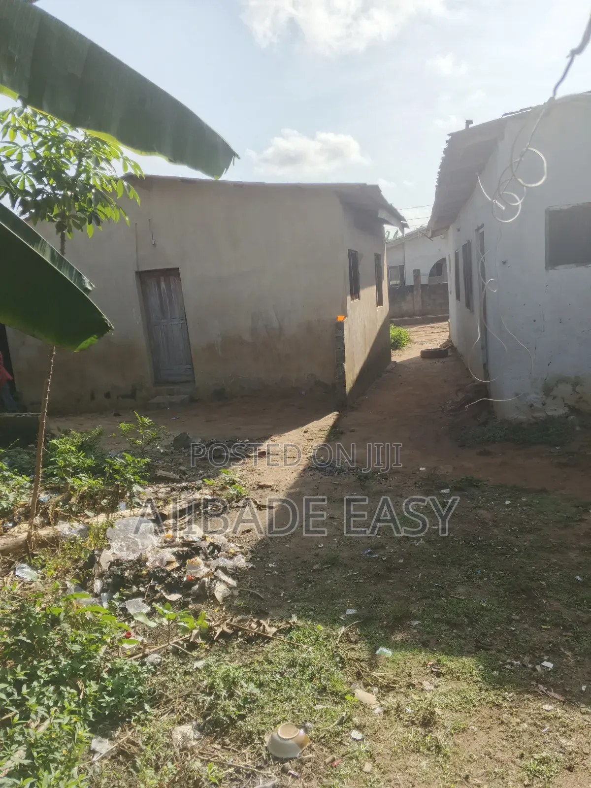 Almost Half Plot of Land With Mini Flat on It in Ayobo