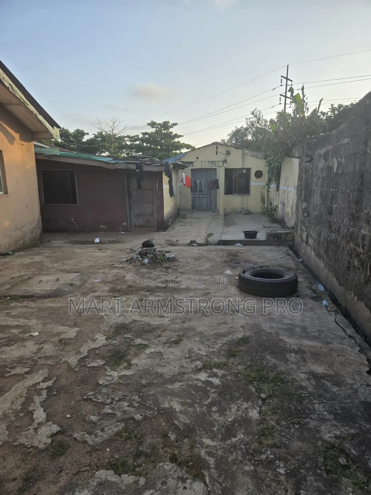 A Good Commercial Land in Heart of Town With Demolishable Structures in Ikorodu Garage