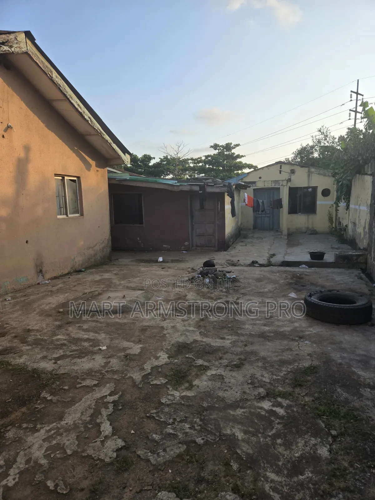 A Good Commercial Land in Heart of Town With Demolishable Structures in Ikorodu Garage