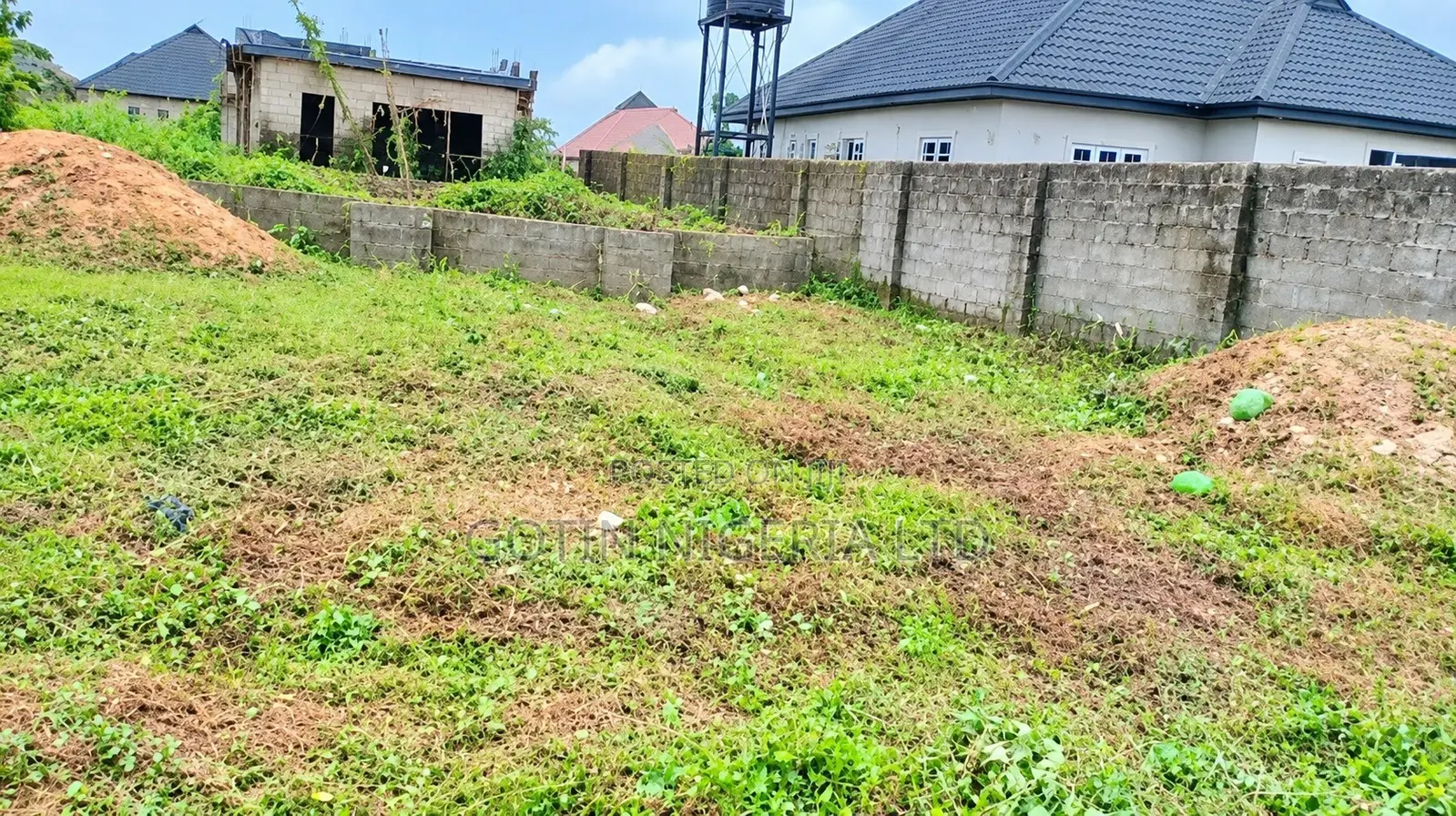 50ft × 100ft Plot of Land With Existing 4-Bedroom Bungalow Foundation in Benin City