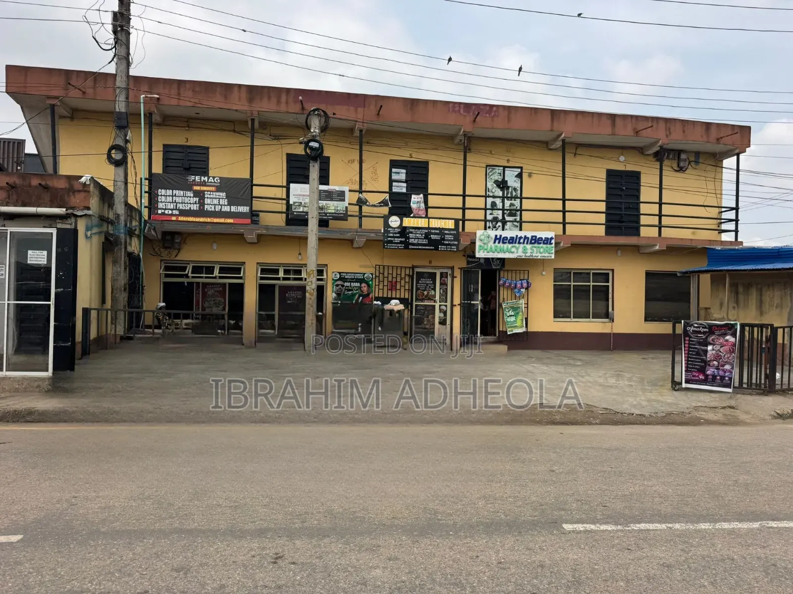 Land Measuring 380sqm With a Complex Which Consists of Various Shops in Ifako-Ogba