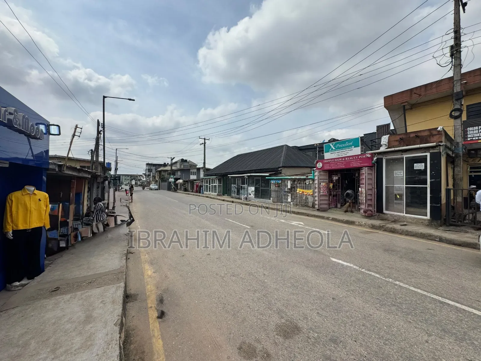 Land Measuring 380sqm With a Complex Which Consists of Various Shops in Ifako-Ogba