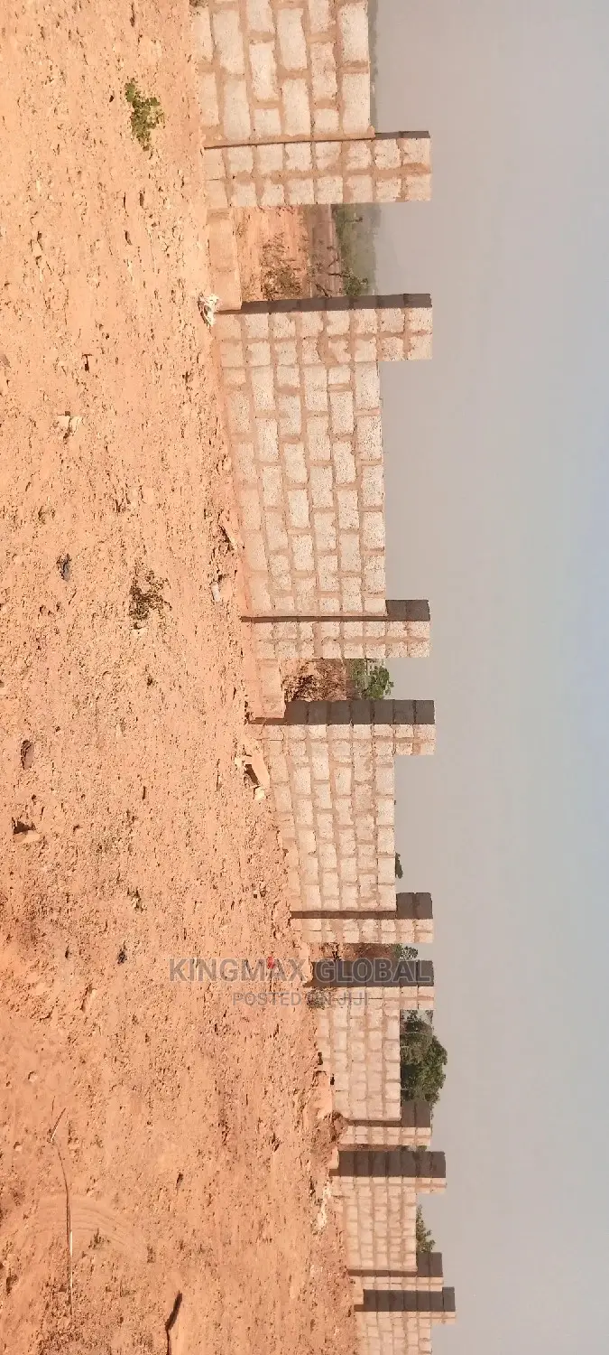 FLAT and Gated 1.2htrs Residential Land in Jabi Tarred Road in Jabi
